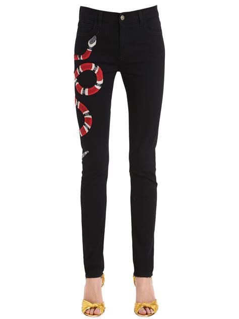 women's gucci jeans|gucci snake embroidered jeans.